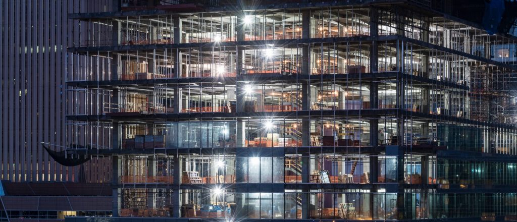 A "smart" office building is able to continue construction because the builder was able to get bas equipment despite supply chain issues.