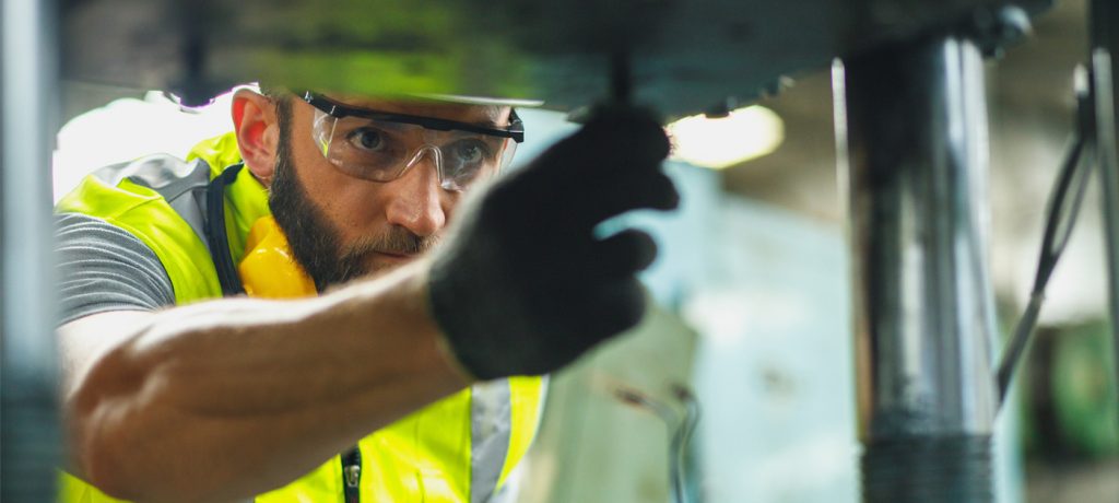 A technician checking on a building automation system.